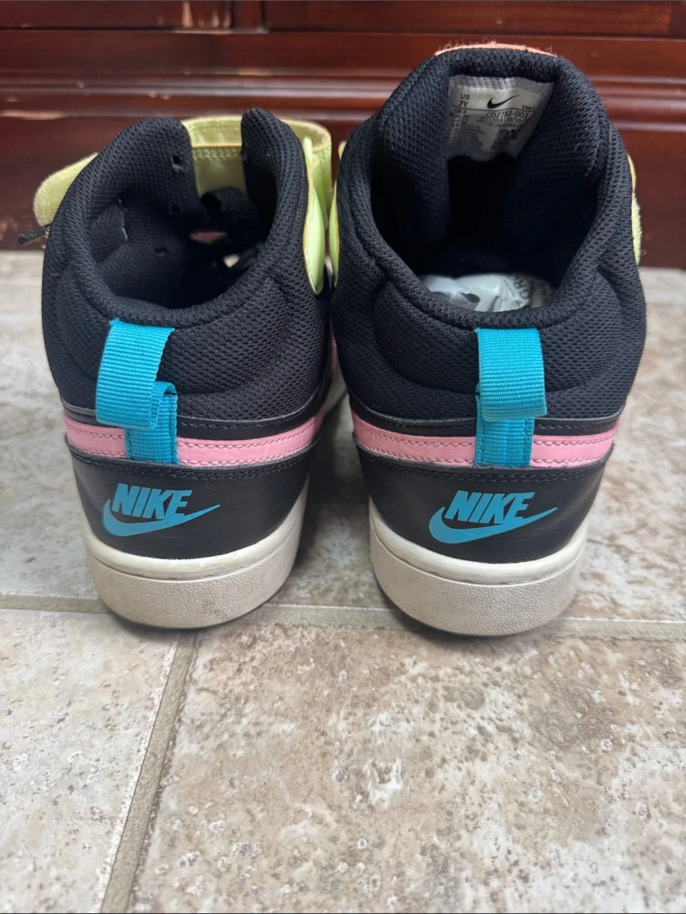 Nike Kids Black High-Top Sneakers with Pink Swoosh and Lime Strap